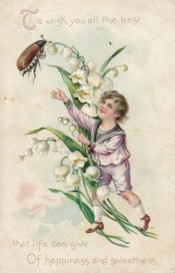BIRTHDAY, PU-1909; Boy with huge lily reaching for beetle, TUCK #105
