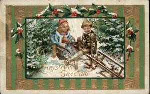 Christmas Little Girl and Boy Sledding c1910 Vintage Postcard