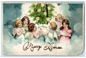 1906 Christmas Angels Cherub Caroling Christmas Tree Candles Embossed Postcard 