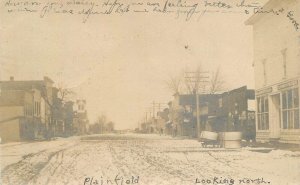 Postcard RPPC 1907 Iowa Plainfield Street scene looking north 23-12089