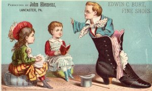 Victorian Trade Card - Edwin C. Burt - Fine Shoes, Boy in Shoe 2 Girls