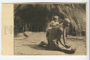 438973 German africa young mother and child prepare food Vintage postcard