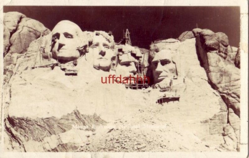 MOUNT RUSHMORE NATIONAL MONUMENT near completion. scaffolding in place RPPC 1941