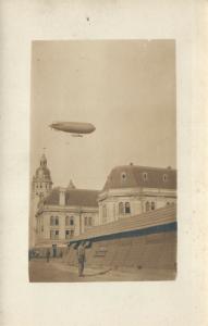 DIRIGIBLE in the SKY OF EUROPEAN TOWN ANTIQUE REAL PHOTO POSTCARD RPPC