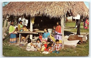 1960 TITUSVILLE FL SEMINOLE INDIANS IN FLORIDA BY CHICKEE POSTCARD P3553