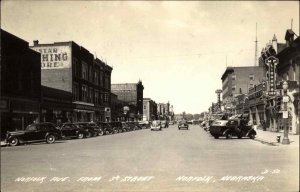 Norfolk NE Street Scene Cars Store Signs Real Photo Postcard