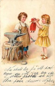 Early Chromograph Postcard; Blacksmith Boy to Fix Doll's head for Little Girl