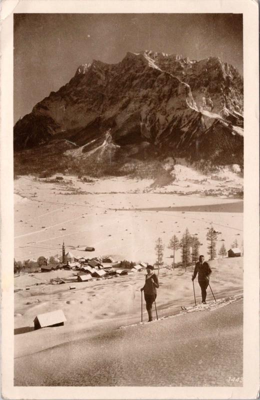 Winter in Lermoos and Ehrwald Tirol Austria Man Woman Skiing RPPC Postcard E32