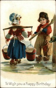 Birthday Adorable Little Dutch Boy and Girl Fetch Water c1910 Vintage Postcard