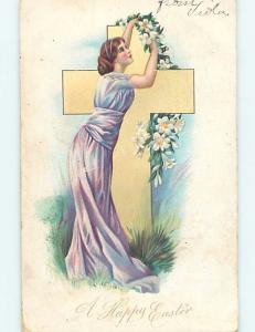 Pre-1907 religious PRETTY WOMAN DECORATES JESUS CROSS WITH EASTER LILIES HL0876