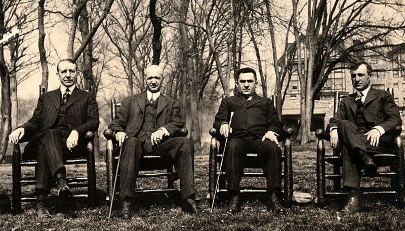 c1910 DISTINGUISHED GROUP OF MEN WITH CANES RESORT HOME RPPC POSTCARD 43-172