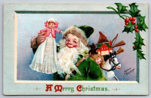 Frances Brundage Christmas~Santa Boy In Green Suit Holds Doll~Frame~Emboss~1911