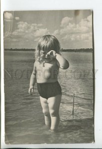 459212 1963 little girl under sun lake drowned her umbrella photo Perevoshchikov