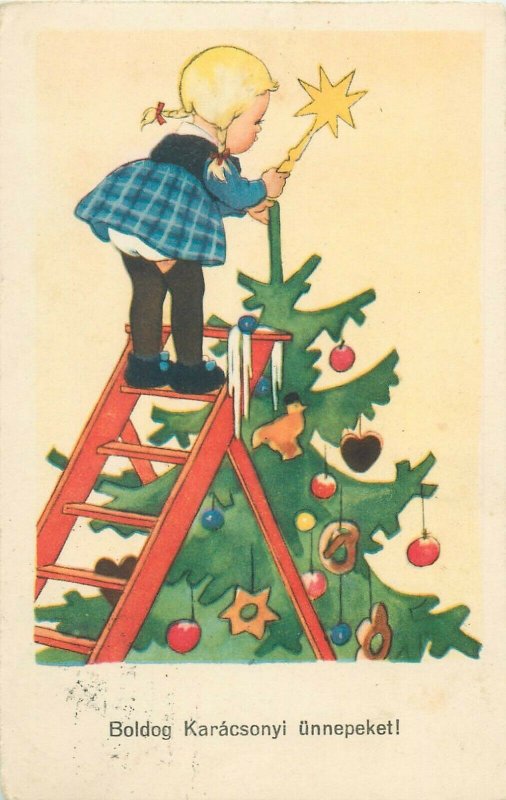 Hungary circa 1940 Christmas tree fantasy postcard girl star
