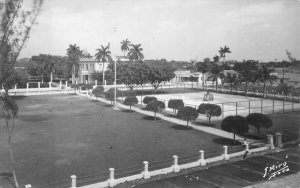 RPPC FLORIDA RESIDENTIAL VIEW J. MIRO REAL PHOTO POSTCARD (c. 1950s)