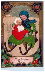 1910 Christmas Mother And Kid Handwarmer Sledding Snowfall Berries Postcard