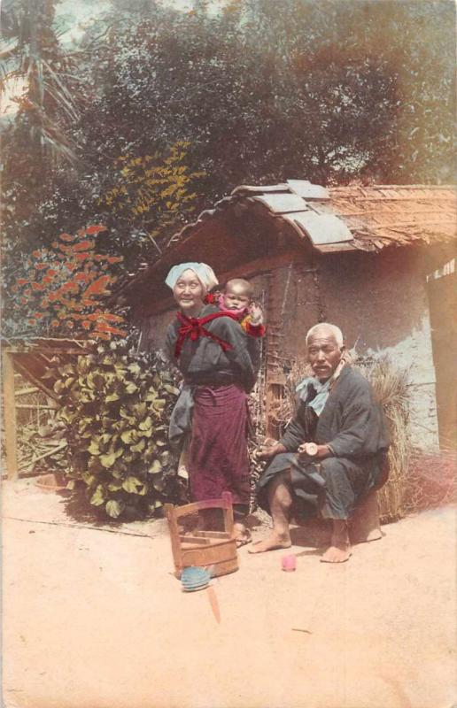Japan Old Woman and Man with Baby Tinted Real Photo Antique Postcard J81225