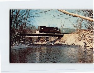 Postcard - Penn Central Geep crosses the Housatonic River at Lee, Massachusetts