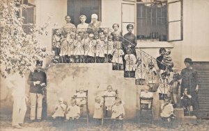 FRANCE ?~ORPHANAGE~LARGE NUMBER OF CHILDREN-REAL PHOTO WW1 ERA POSTCARD