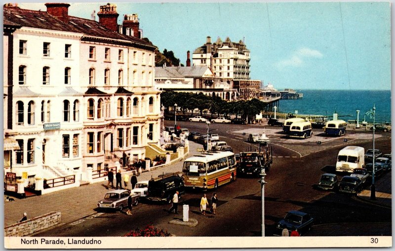 North Parade Llandudno Wales Street View Buildings Buses and Cars Postcard