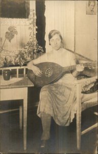 Woman Sitting w/ Guitar 1920s Amateur Real Photo Postcard Music Instrument