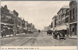 1912 Fargo North Dakota Broadway Looking North Postcard Car Street View H82