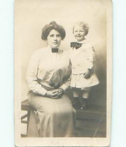 Bent circa 1910 rppc LITTLE BOY WEARING BOW TIE WITH A DRESS BESIDE MOM o2543