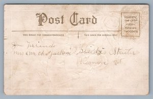 KIDS SKATING EMBOSSED CHRISTMAS ANTIQUE POSTCARD