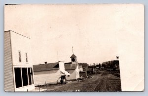 J90/ near Plymouth Wisconsin RPPC Postcard c1910 Street Scene Stores 419