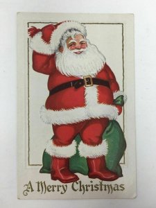 Jolly Santa Claus Christmas Bag of Toys Gifts Postcard Embossed Posted 1933