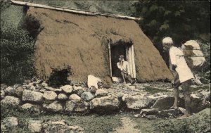 Hawaii Natives & Thatch Roof Home 23/Csouth Seas Curio Honolulu Postcard