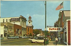 Brookville PA Main Street Rexall Drug VFW Bank Storefronts Old Cars Postcard