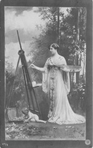 Postcard C-1910 Pretty Woman artist painting easel Palette Fantasy  TP24-2635