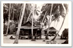 New Guinea Oceania Native Huts on the Shoreline Postcard RPPC Real Photo