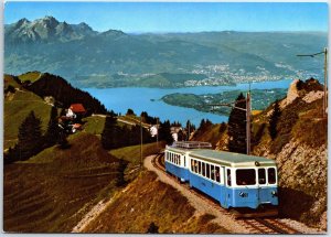 VINTAGE CONTINENTAL SIZE POSTCARD THE MOUNTAIN RAIL CAR AT RIGI LUCERNE SWISS