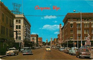 Cheyenne Wyoming Capitol Avenue Autos Eaton Movie Marquee 1960s Postcard 21-6524