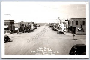K29/ Murdo South Dakota RPPC Postcard c1940s main Street Stores Cafe 325