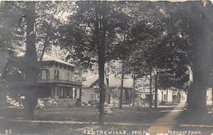 Centreville Michigan~Beautiful Homes~Porch Swing~Yard Shaded by Trees~1910 RPPC
