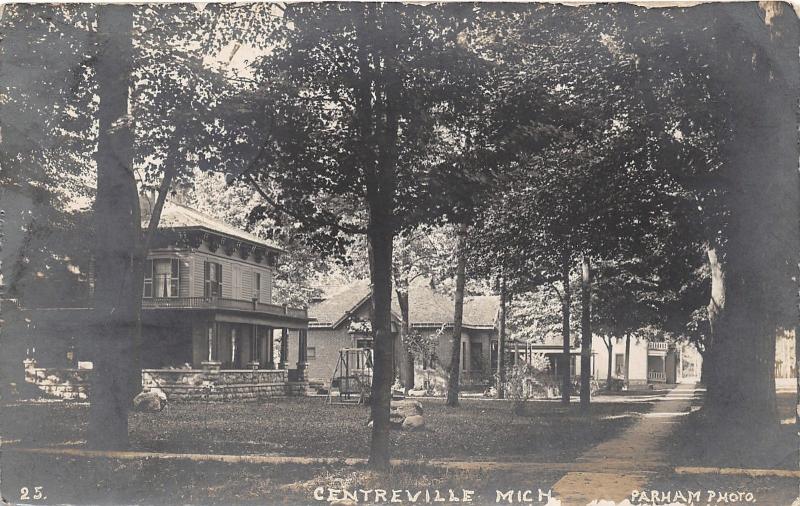 Centreville Michigan~Beautiful Homes~Porch Swing~Yard Shaded by Trees~1910 RPPC