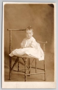 RPPC Adorable Baby Portrait on Rustic Chair c1908 Real Photo Postcard H27