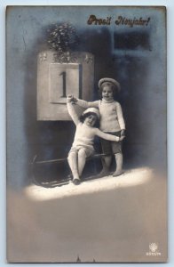 Austria Postcard RPPC Photo New Year Cute Children c1910's Antique Posted