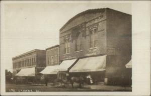 Lamont IA Beautiful Buildings Signs Awnings c1910 Real Photo Postcard