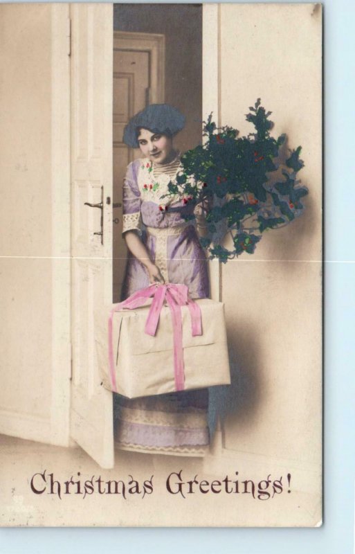 RPPC CHRISTMAS GREETINGS~ Pretty YOUNG WOMAN w/HOLLY, GIFT  1912   Postcard