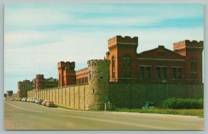Deer Lodge Montana~State Prison~Castle Towers~1950s Cars~Postcard