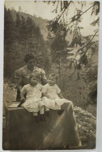 RPPC Woman Children on Table Lovely Eyelet Dresses c1910 Postcard R4