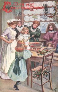 Christmas, Tuck No 8282, Sauber, Woman Surrounding a Girl with a Spoon over Bowl