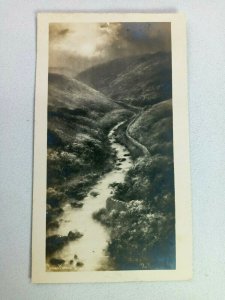 Vintage Postcard Stream Going through Mountain Side Scene RPPC