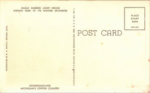 Poscard MI Eagle Harbor LightHouse in winter