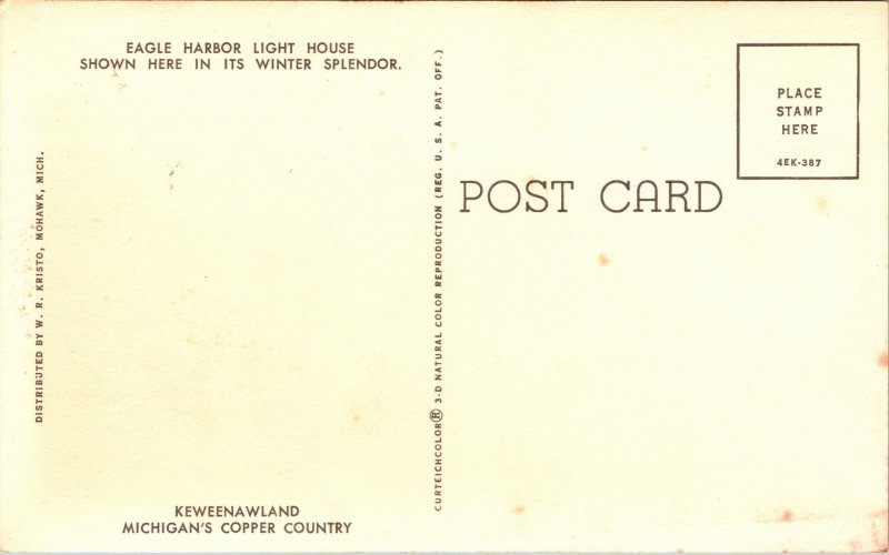 Poscard MI Eagle Harbor LightHouse in winter