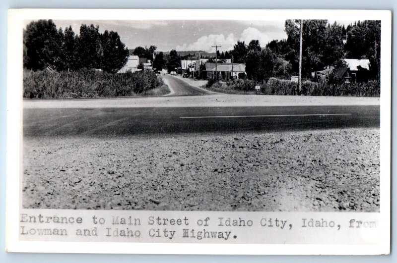 Idaho City ID Postcard RPPC Photo Entrance To Main Street Lowman Idaho City Hwy